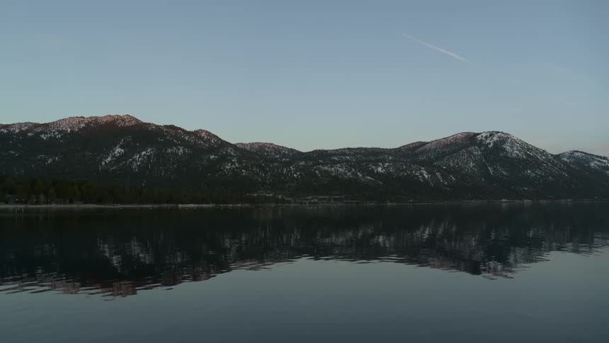 Water is flowing and rippling in lake in the mountains