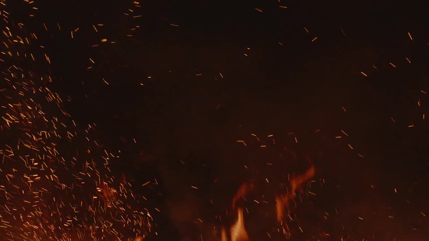 Couple Kissing By Fire In Desert