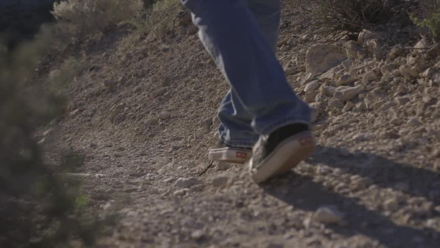 A person walking on a trail