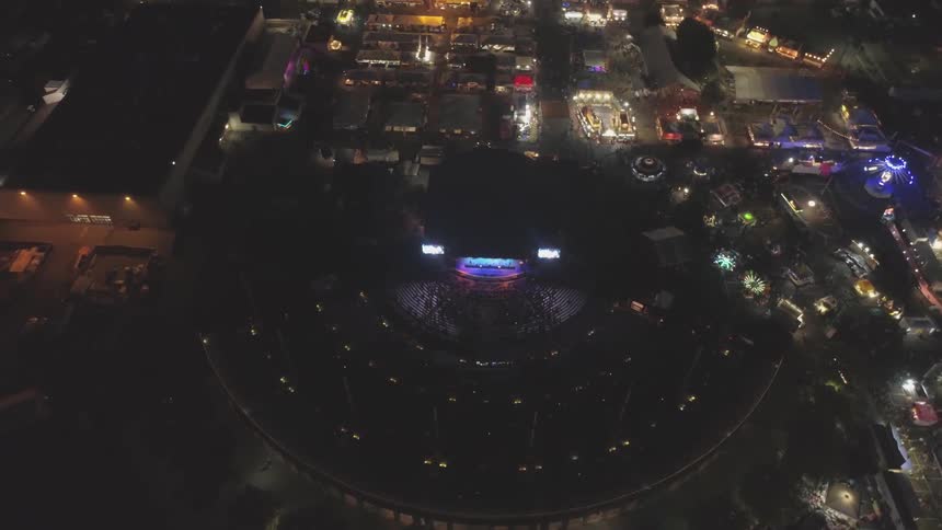 A concert going on oat a large venue