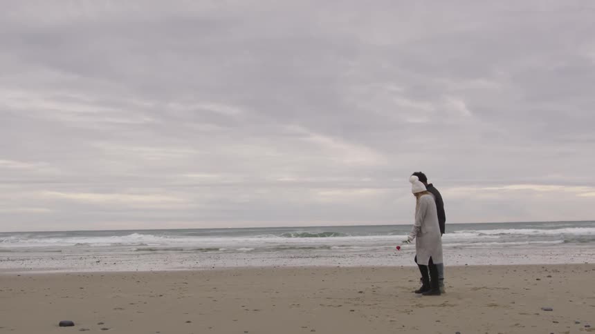 Couple On The Beach
