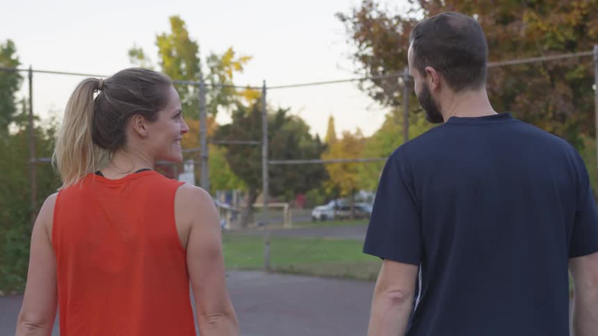 Couple Playing Tennis