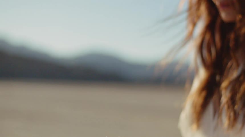 Woman In Dress In The Desert