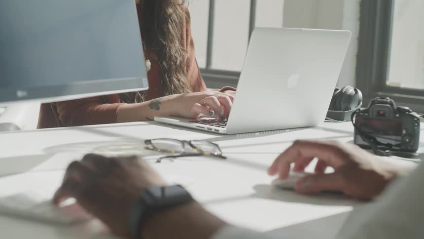 Young Creatives Working At Small Office