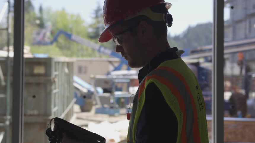 A man is working on construction