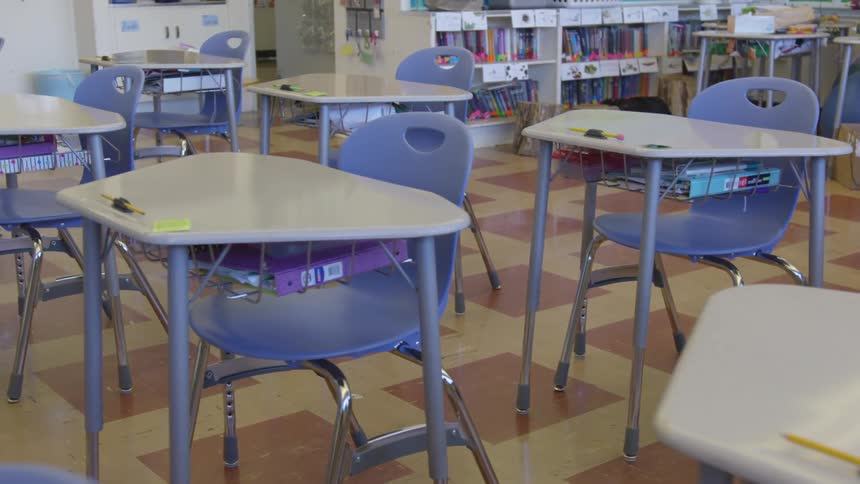 Kids classroom with desks and chairs