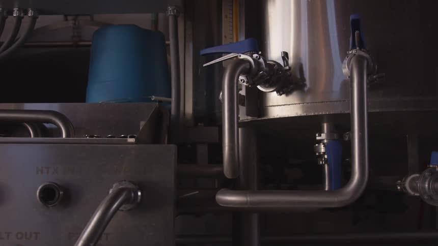 Shiny stainless steel machinery and a shaky camera view do little