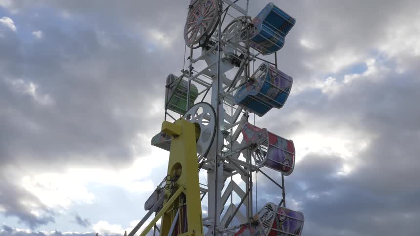Carnival ride under dark skies