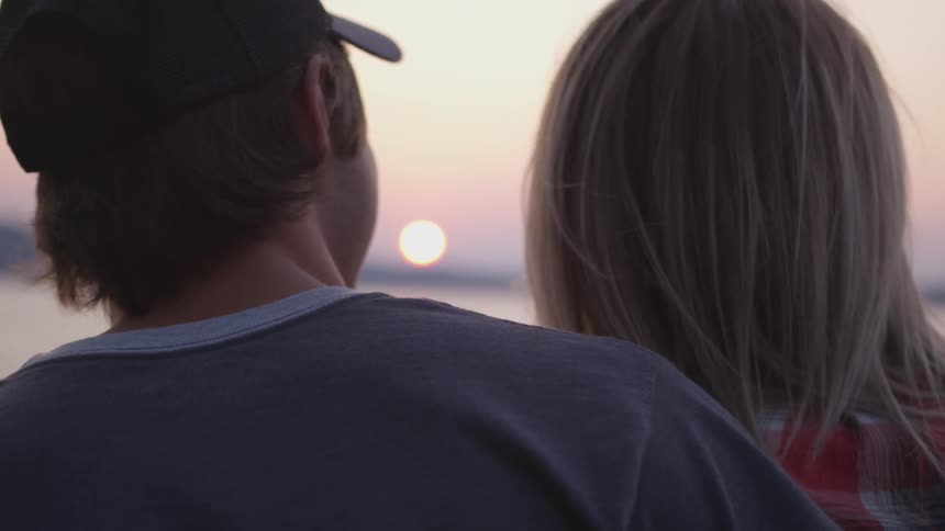 Couples walking on a beach