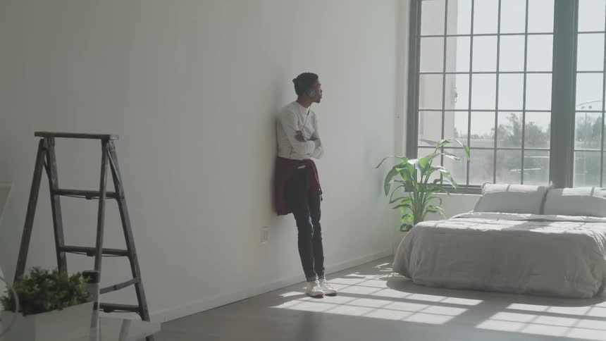 Man Working And Listening To Music At Home