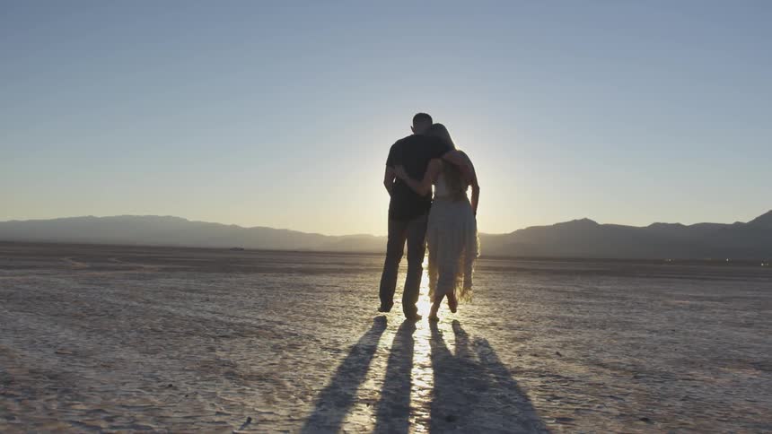 Couple Dancing In The Desert
