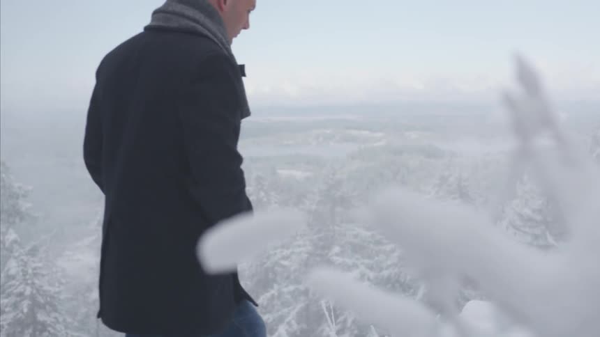 A person walking through the snow