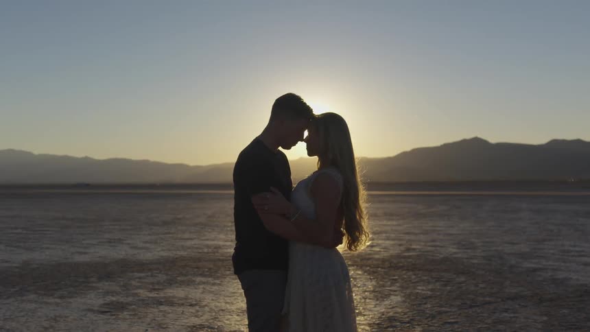Couple Dancing In The Desert