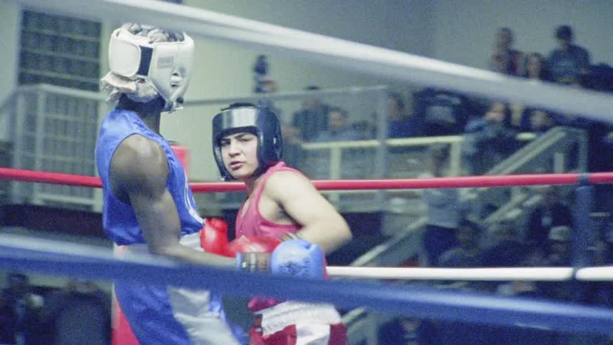 Young Boxer Training And Fighting