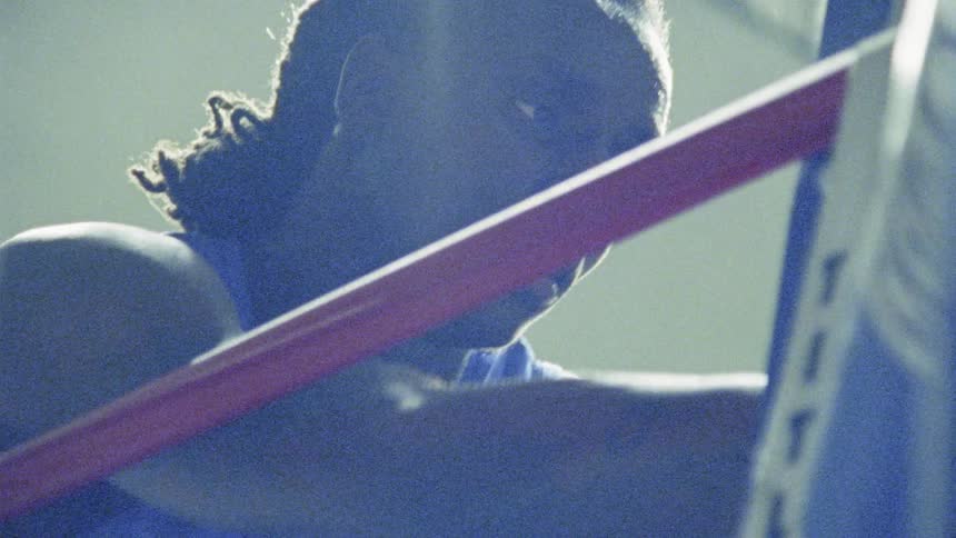 Young Boxer Training And Fighting