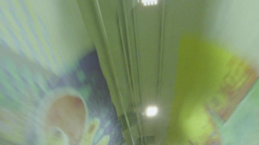 Man walks in a tunnel in a train station