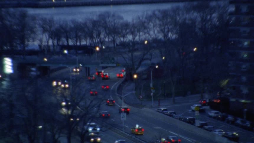 Traffic moving around a large building