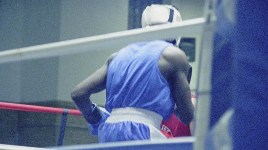 Young Boxer Training And Fighting