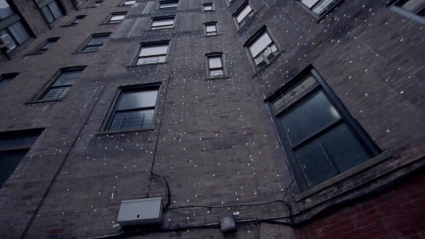 The building is brown and tall