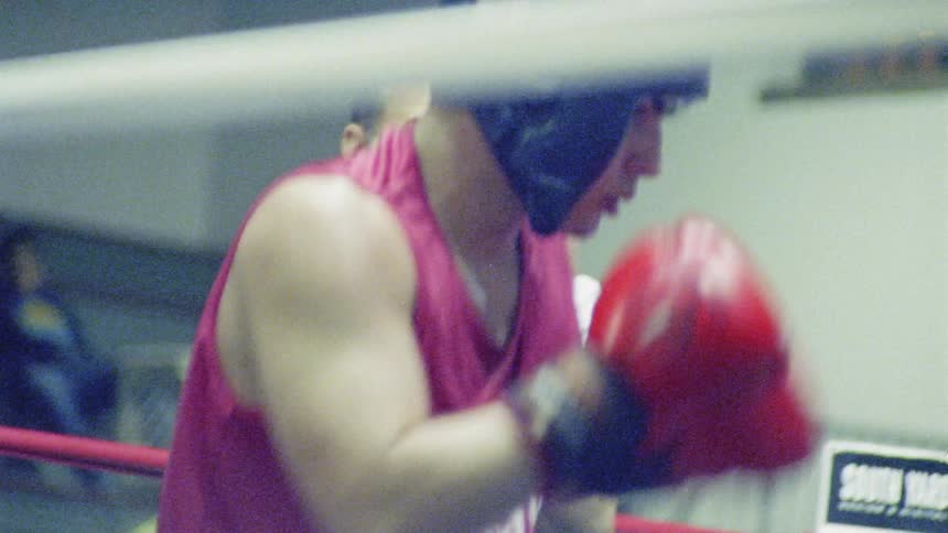 Young Boxer Training And Fighting