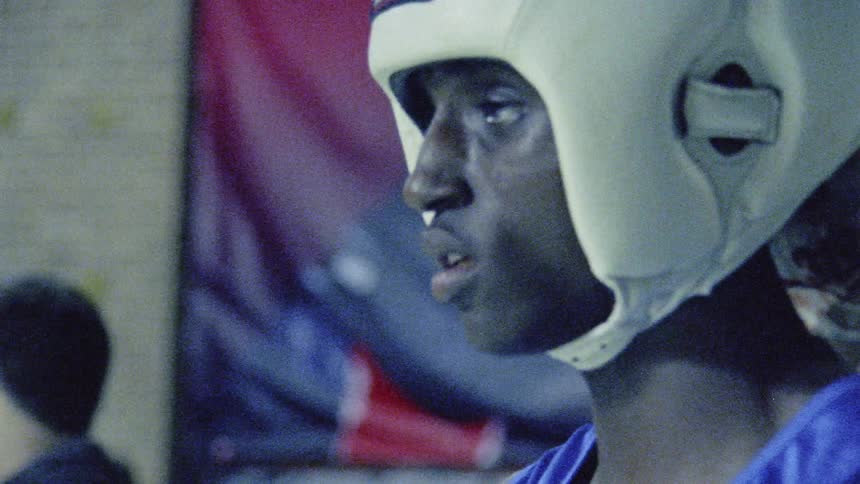 Young Boxer Training And Fighting