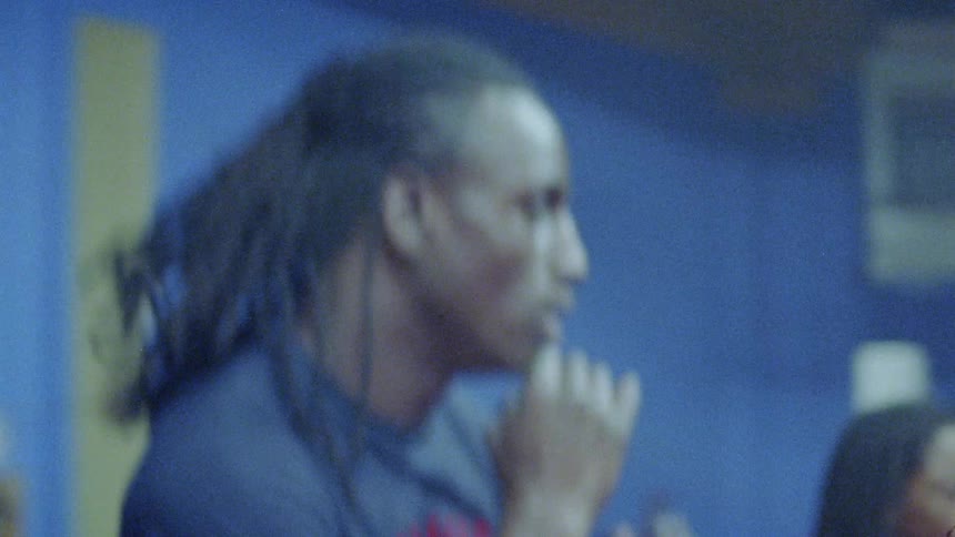 A man practicing boxing skills in the ring