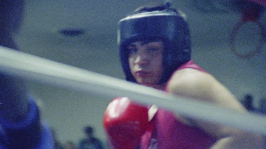 Two men boxing in a ring