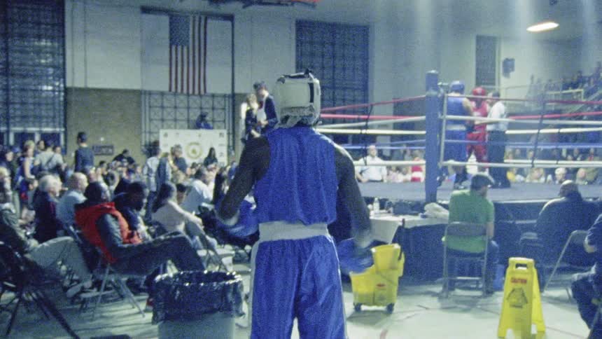 A fighter jumps around to warm up