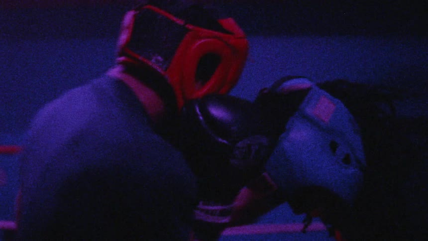 Young Boxer Training And Fighting