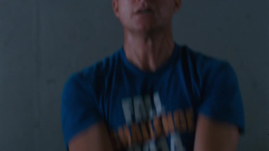 A person using a kettlebell
