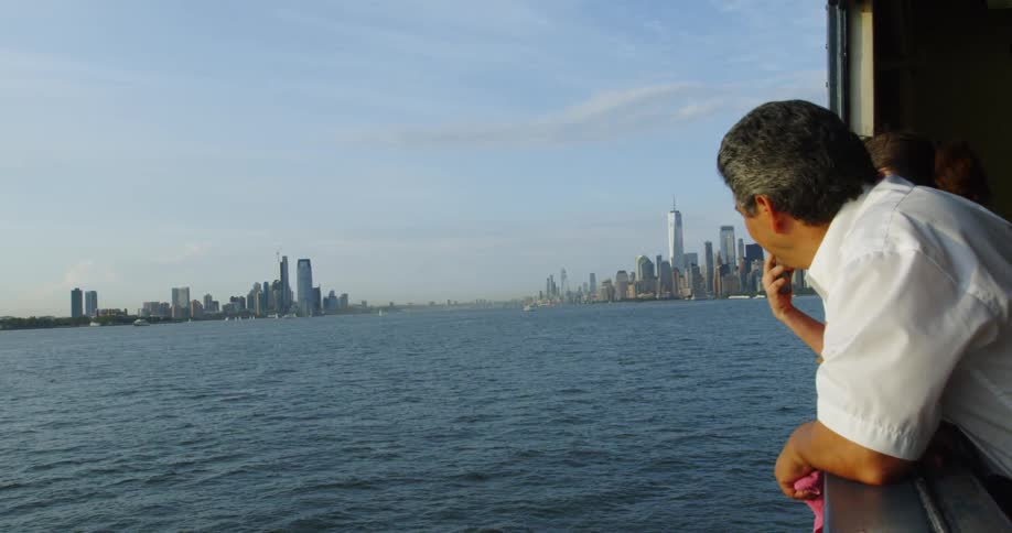 Man on ship looks at water