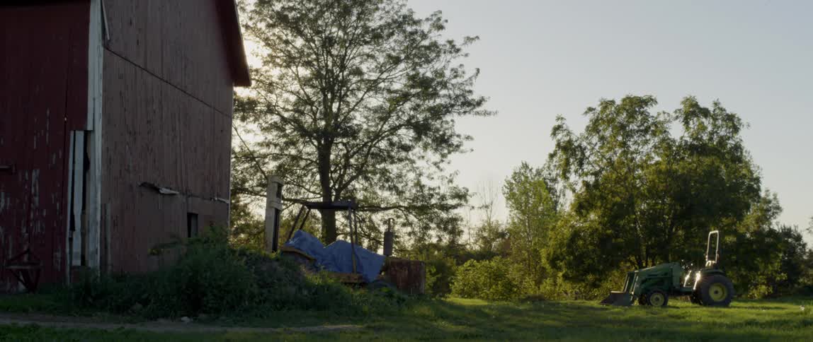 An old barn in a field