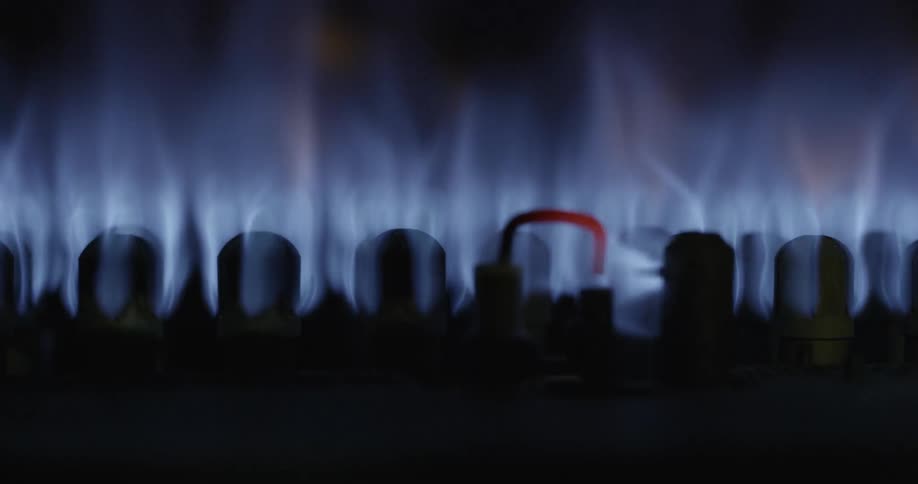 A gas hob is lit