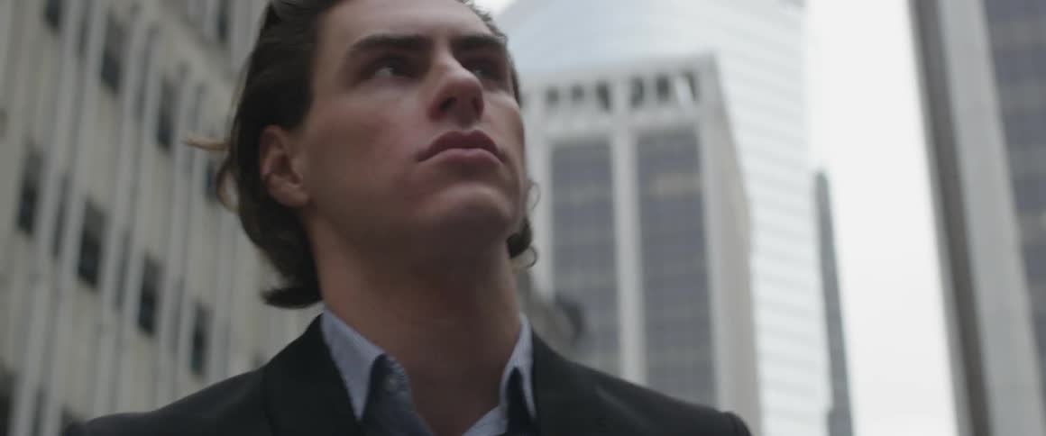 Man Walking Around City
