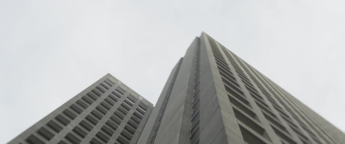 Winding view of skyscrapers from the street