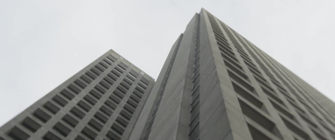 Looking up at  new constructions on a cloudy day
