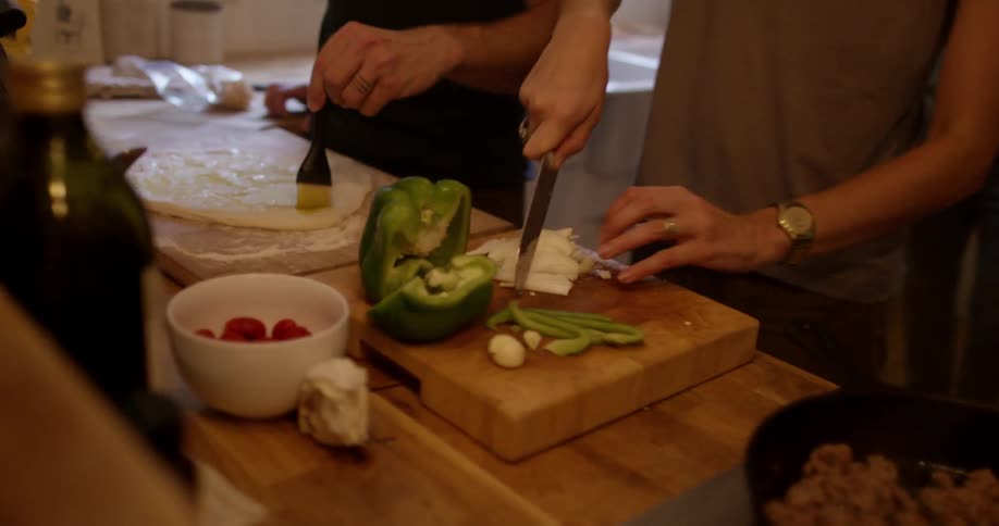Couple preparing food in a kitchen