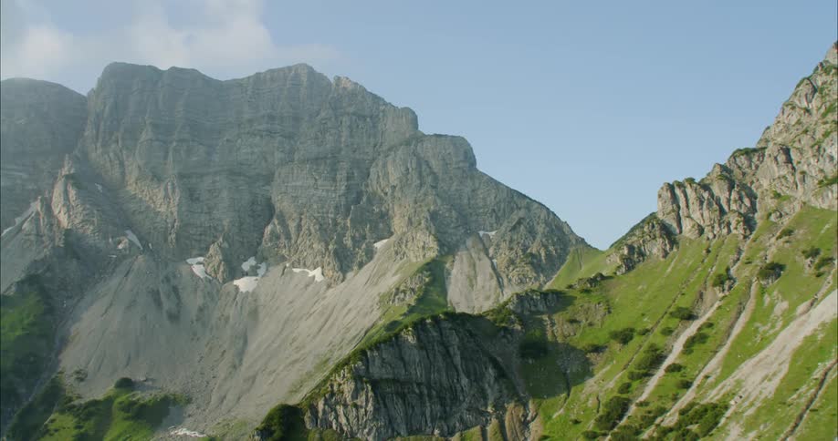 There's grass covering the mountains
