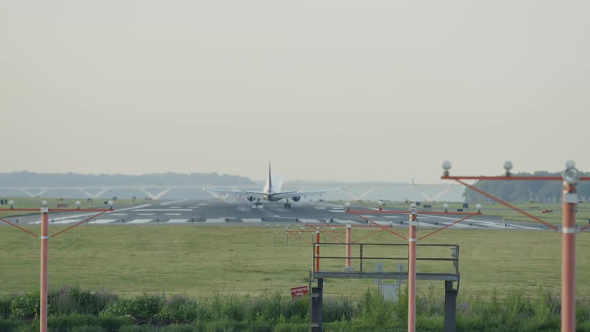 Plane landing on a runway