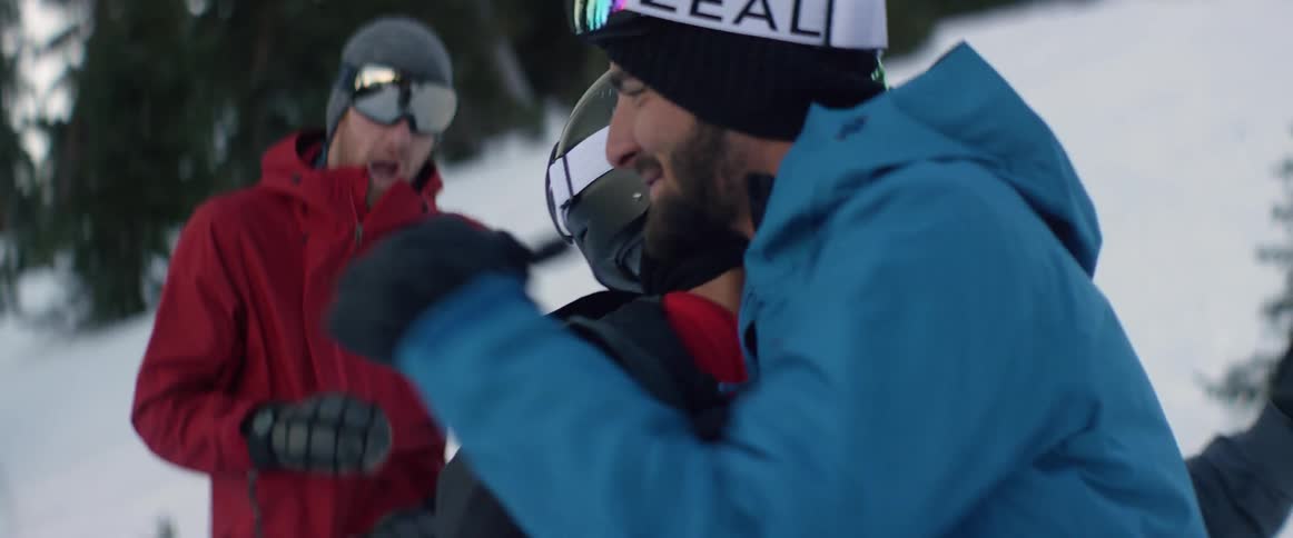 Snowboarders are congratulating each other