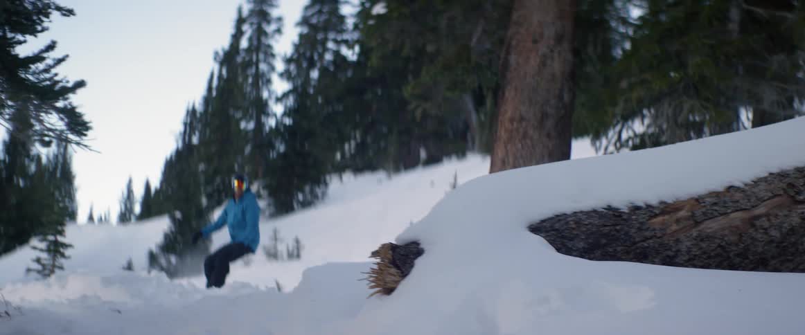 A person snowboarding outdoors
