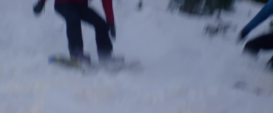 People are snowboarding
