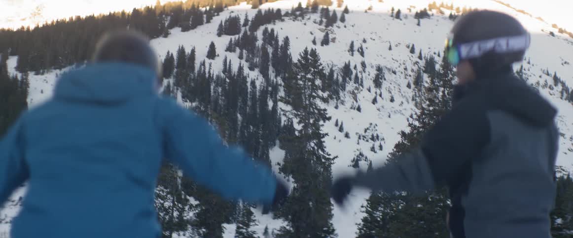 People snowboarding