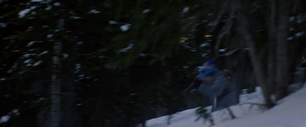 A person is snowboarding