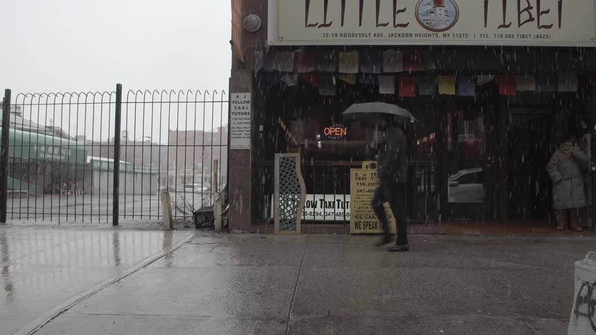 Rain falling in a city