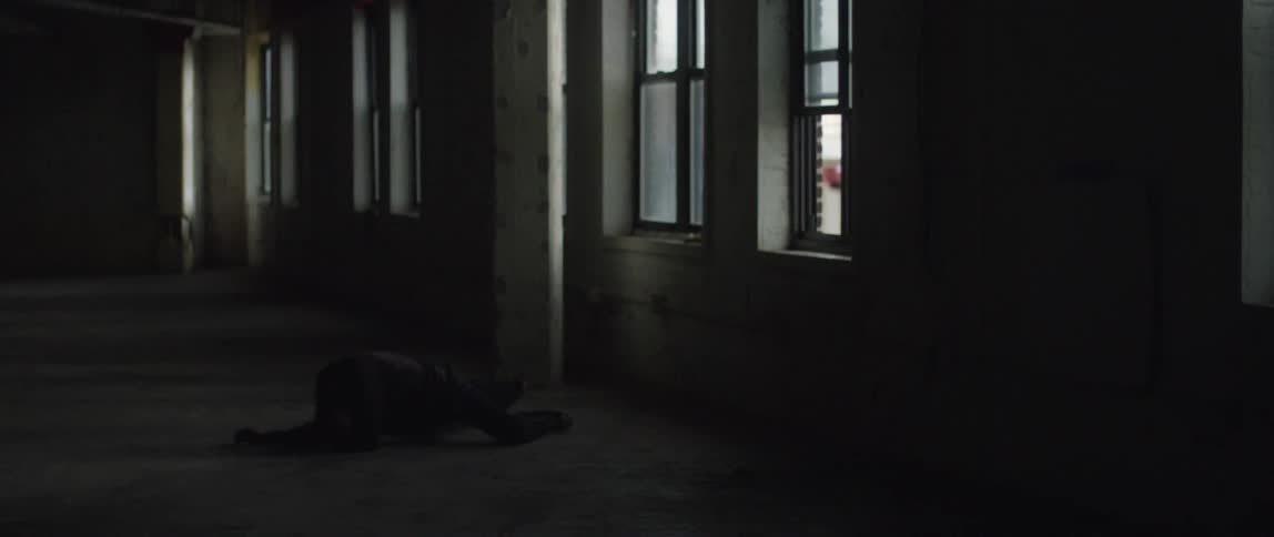 A person laying down on the floor