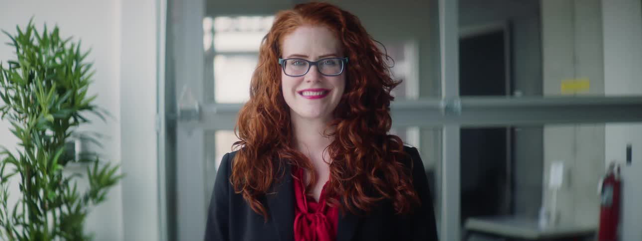 Woman looking into the camera and smiling