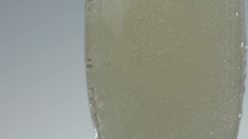Champagne being poured in a glass