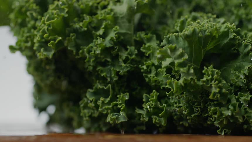 Lettuce falling on a table