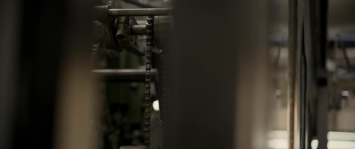A chain moving through a machine